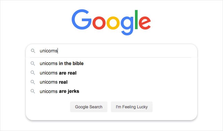 Google search bar displays autocomplete suggestions for "unicorns," including "in the bible," "are real," "real," and "are jerks," on a white background.