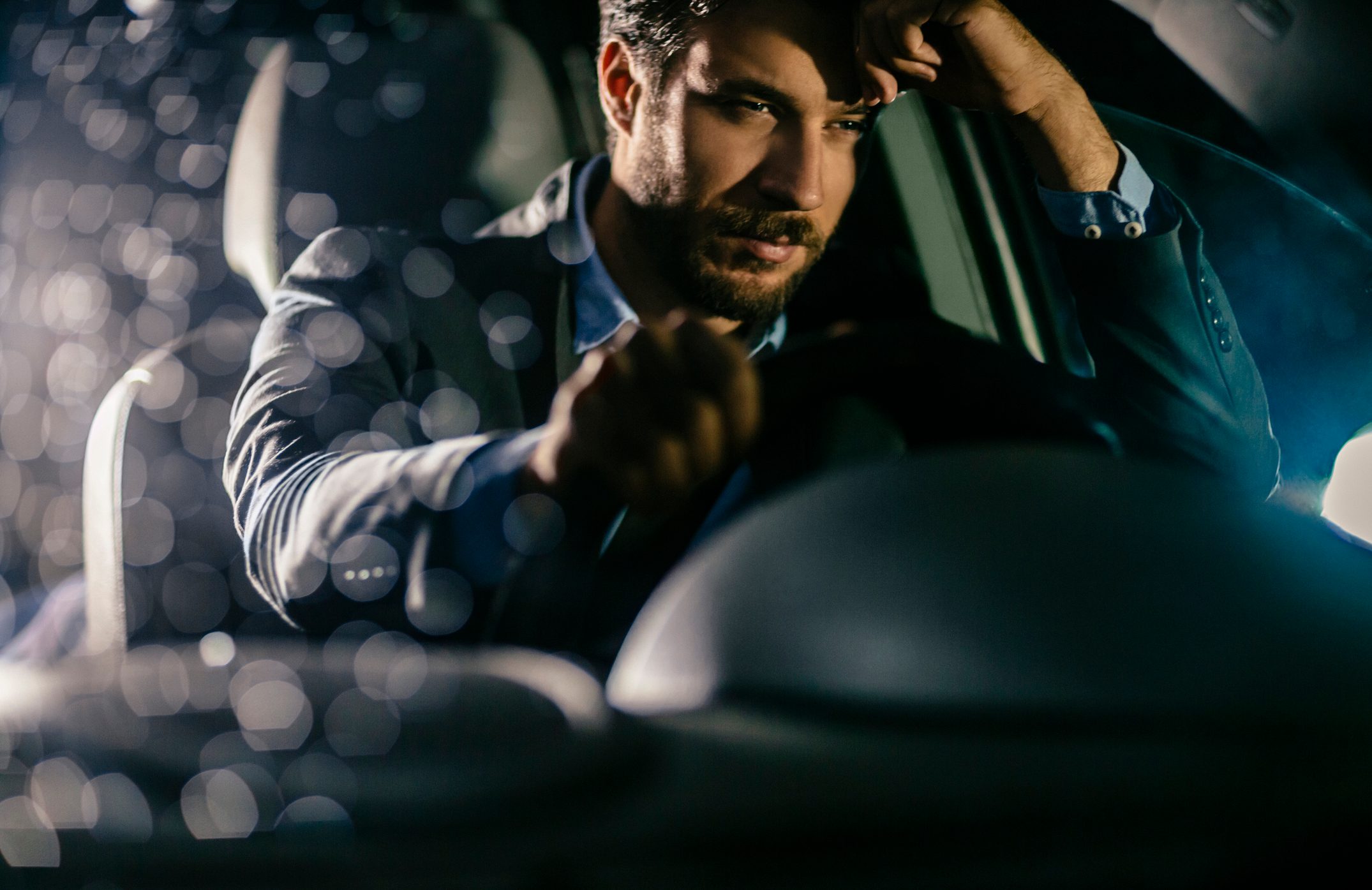 Handsome businessman in car