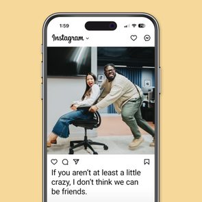 People laughing, a man pushing a woman on a swivel chair in an office. Text: 