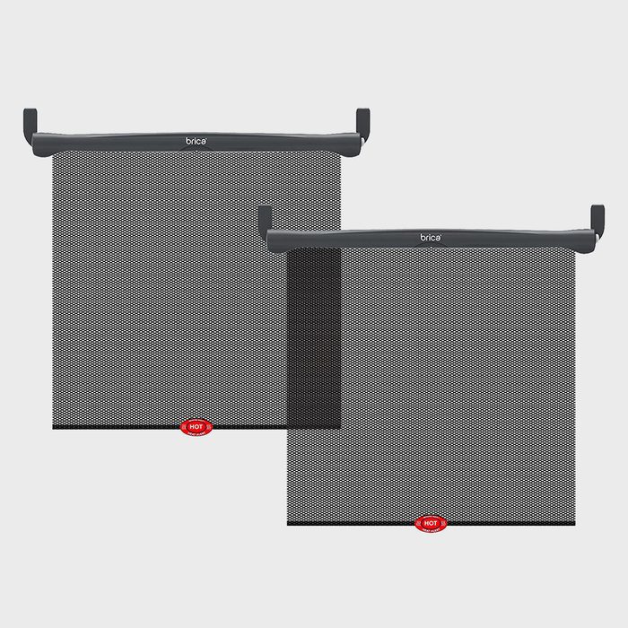 Two black mesh sunshades hang from hooks; both display a 