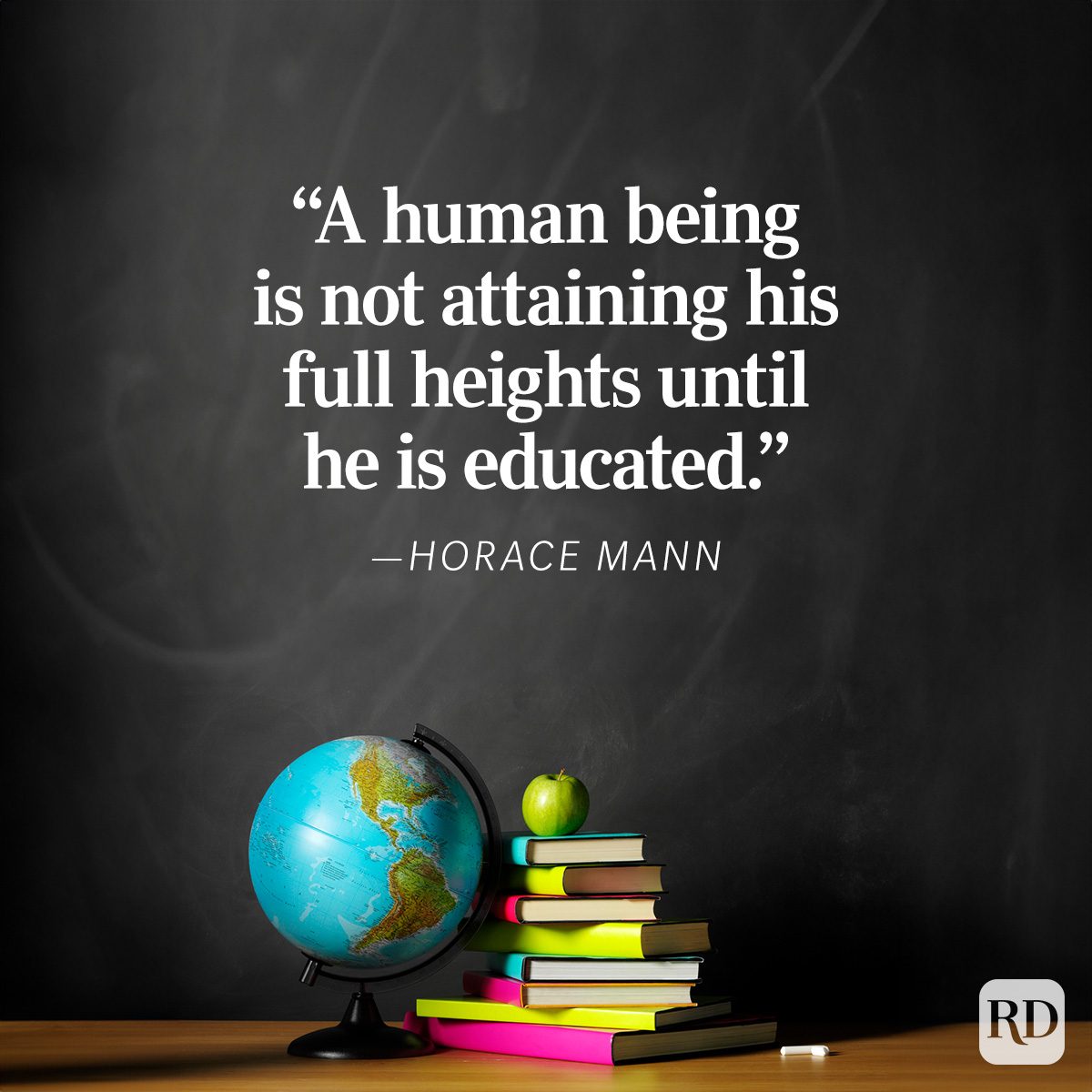 A globe rests on a table with stacked books and an apple, set against a blackboard displaying a Horace Mann quote about education.