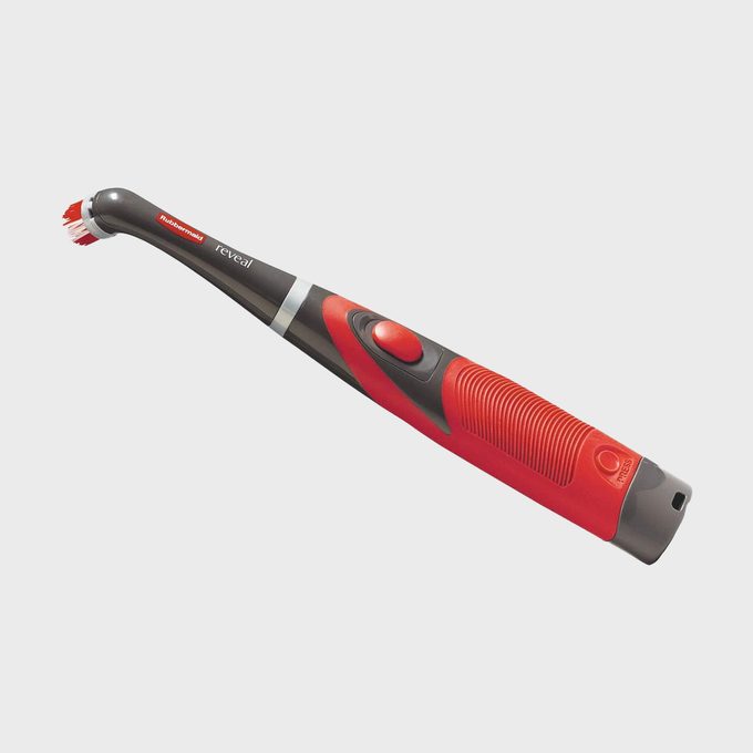 Red and black electric scrub brush with a grey button, displayed on a plain white background. Text reads 