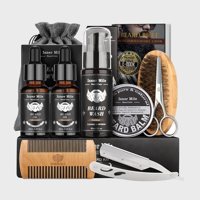 A beard care kit includes oils, wash, balm, comb, scissors, brush, and razor, displayed neatly with a downloadable e-book mentioned in the background.