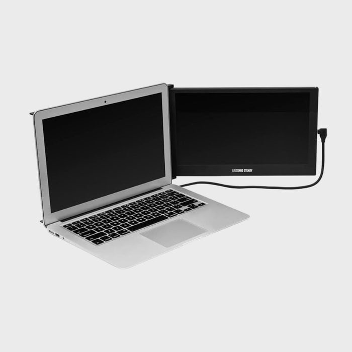 A laptop displays an additional portable screen connected by a cable, positioned on a plain white background.