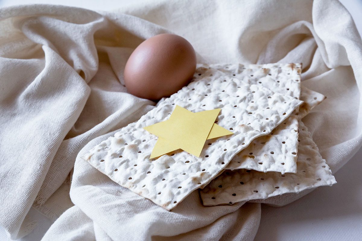 Matzo, egg and star of David, symbols of Passover