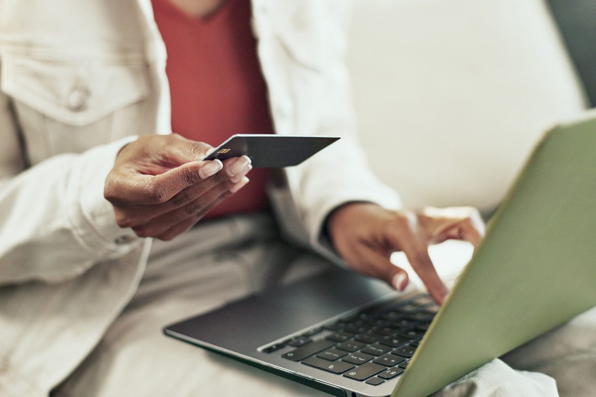 woman using credit card for online shopping