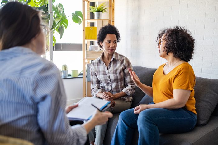 Two lesbian women in a therapy session