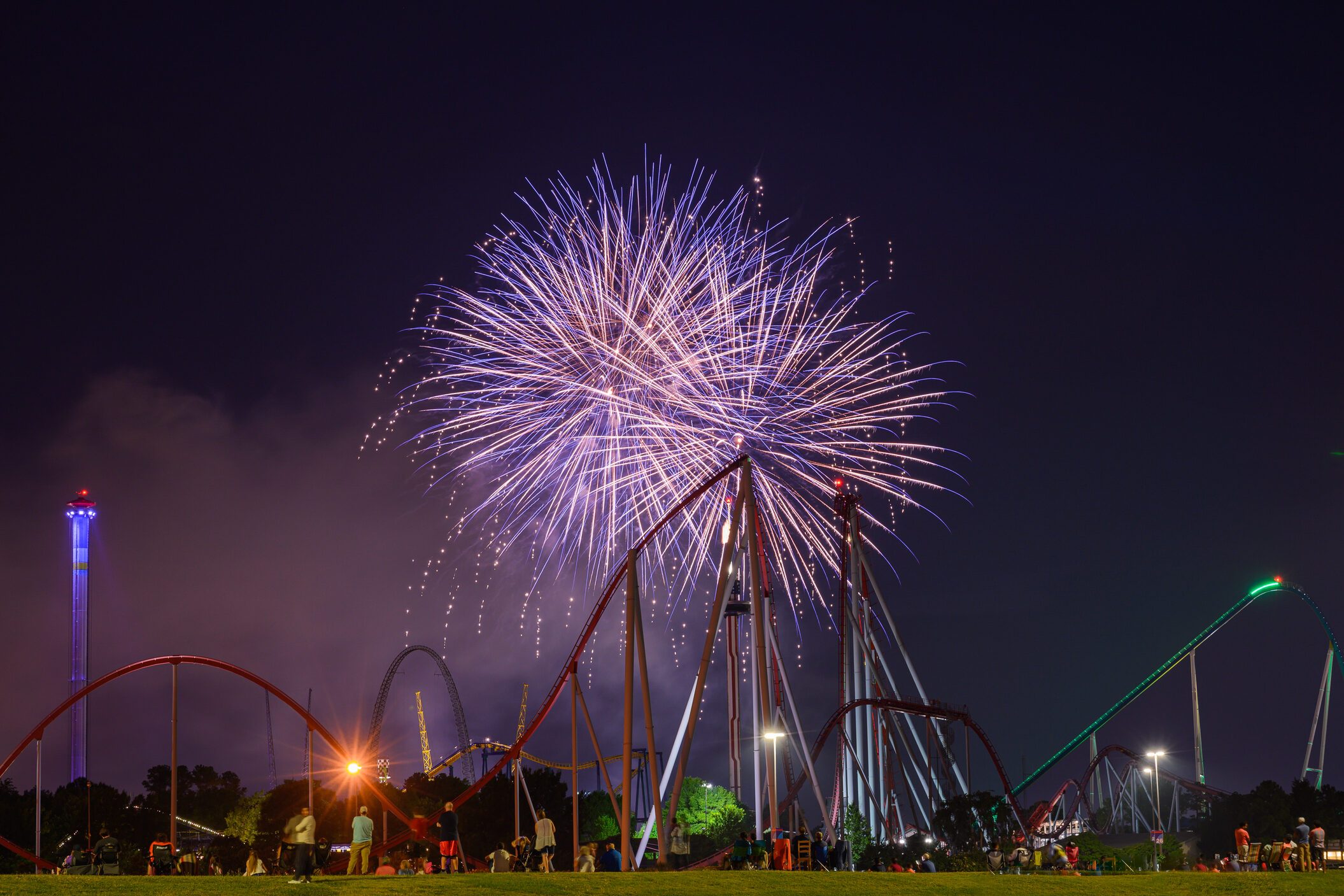 Fireworks illuminate the night sky over Carowinds.