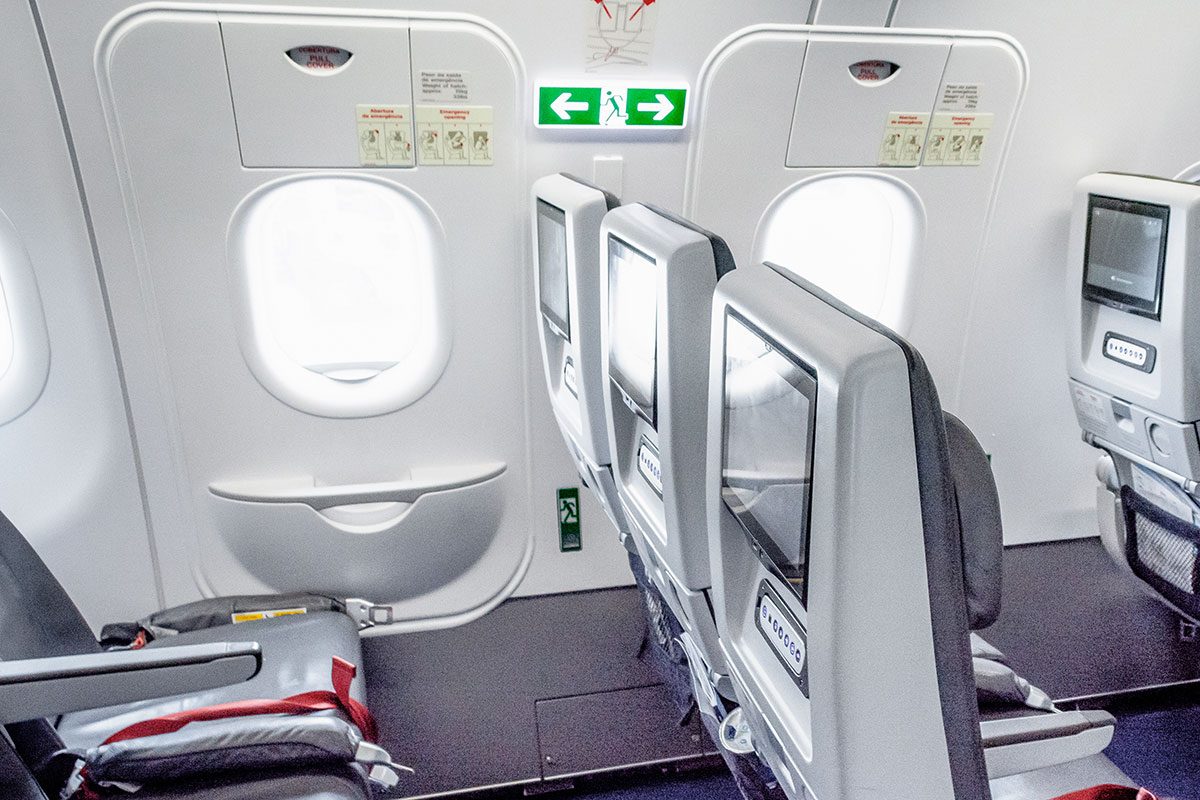 Emergency Exit Seat, Commercial Plane, Passenger Cabin, Economy Class.