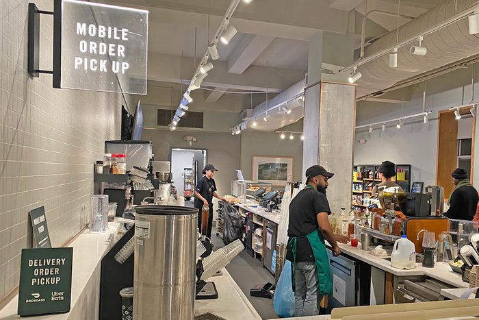 Mobile order and Uber Eats and Doordash delivery pick up area at Starbucks coffee shop