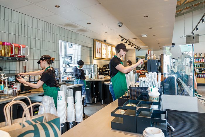 Starbucks Coffee, Baristas at work making drinks