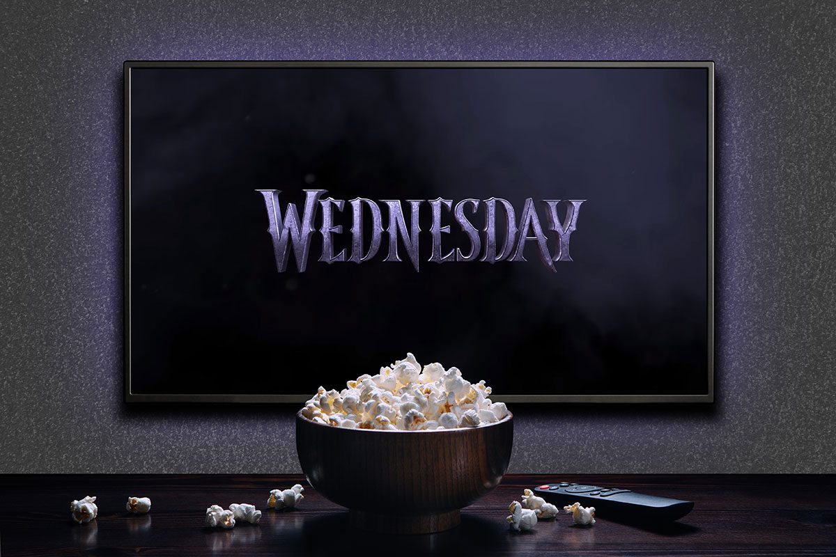TV screen playing Wednesday trailer