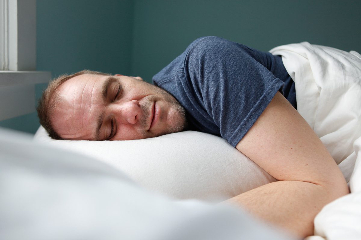 man sleeping on his side